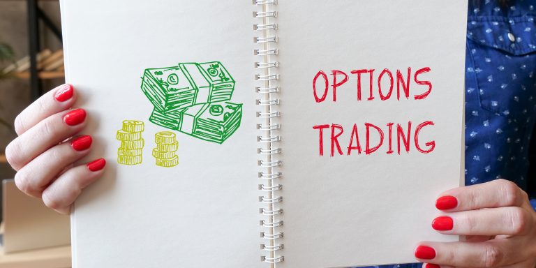 OPTIONS TRADING inscription on the sheet. Option Trading Services